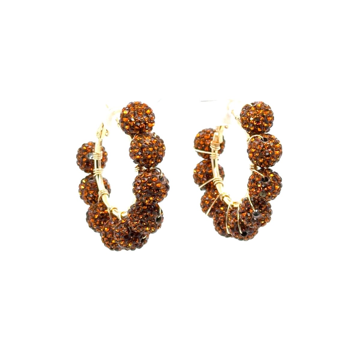 Maeven in Me gold-tone hoop earrings with amber-brown rhinestone beads, shown at an angle.