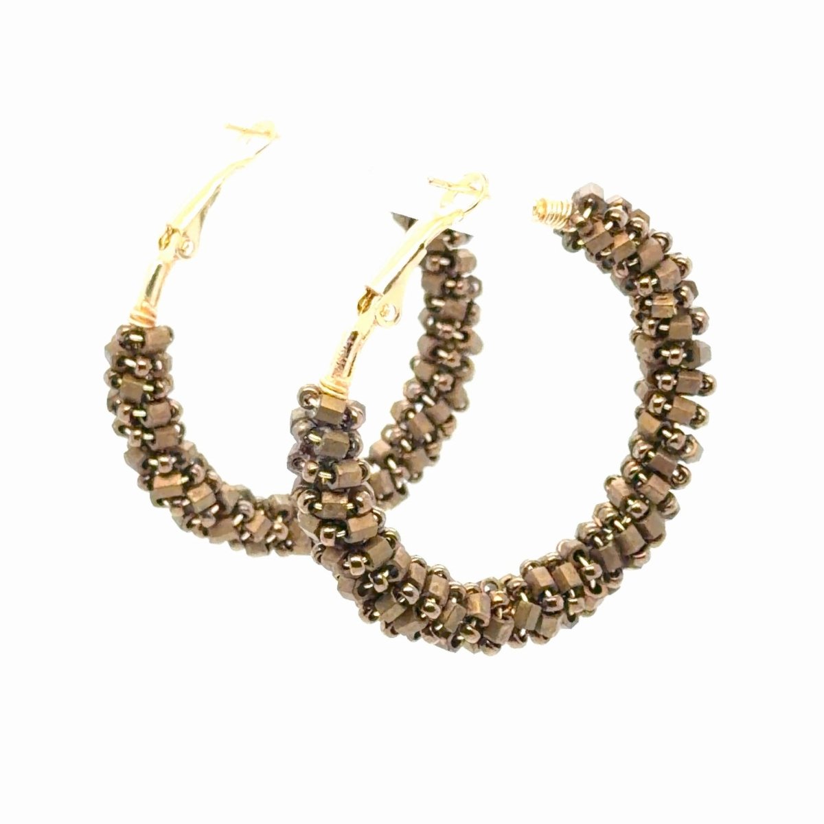 A pair of gold-tone hoop earrings adorned with small, metallic bronze faceted beads, shown against a plain white background.