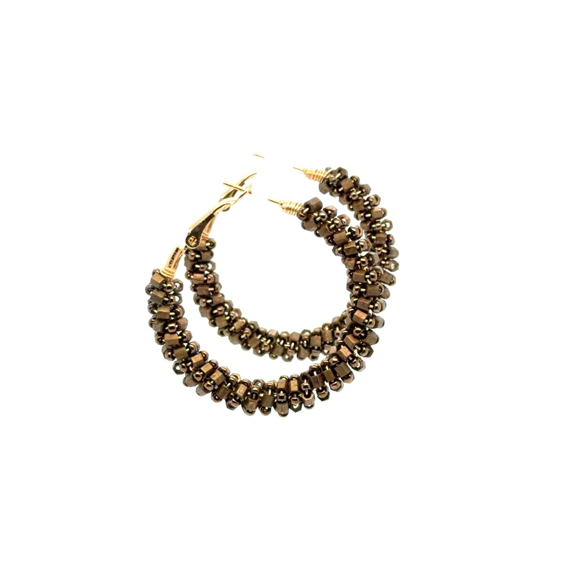 Overlapping Maeven in Me bronze-toned beaded gold hoop earrings with faceted beads and small rounded metallic accents.
