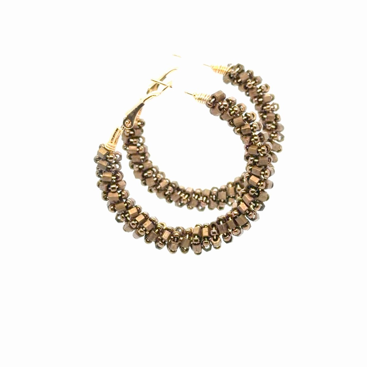  Angled view of Maeven in Me bronze-toned beaded gold hoops showing textured beadwork and open hinged closures.
