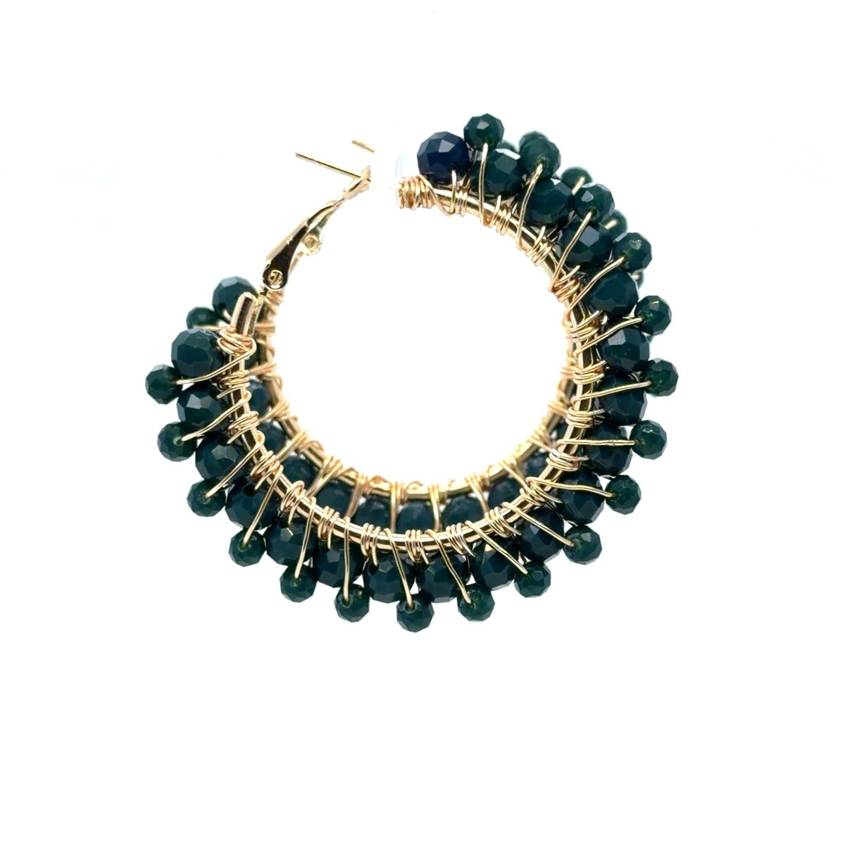 Maeven in Me deep green beaded gold hoop earrings shown overlapping, with faceted bead clusters and open hinged closures.