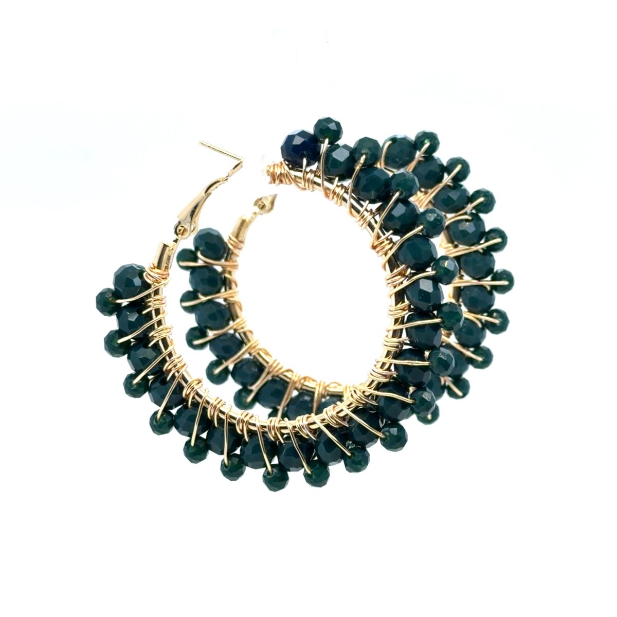 A pair of gold hoop earrings adorned with multiple strands of faceted dark green beads, shown against a plain white background.